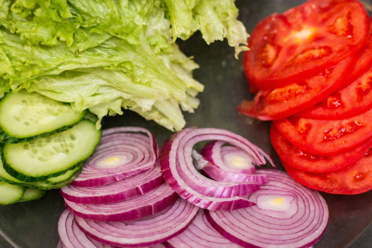 Fresh cut lettuce, tomatoes and onions - Daily prepared vegetables at Super Burger Fresno Clovis